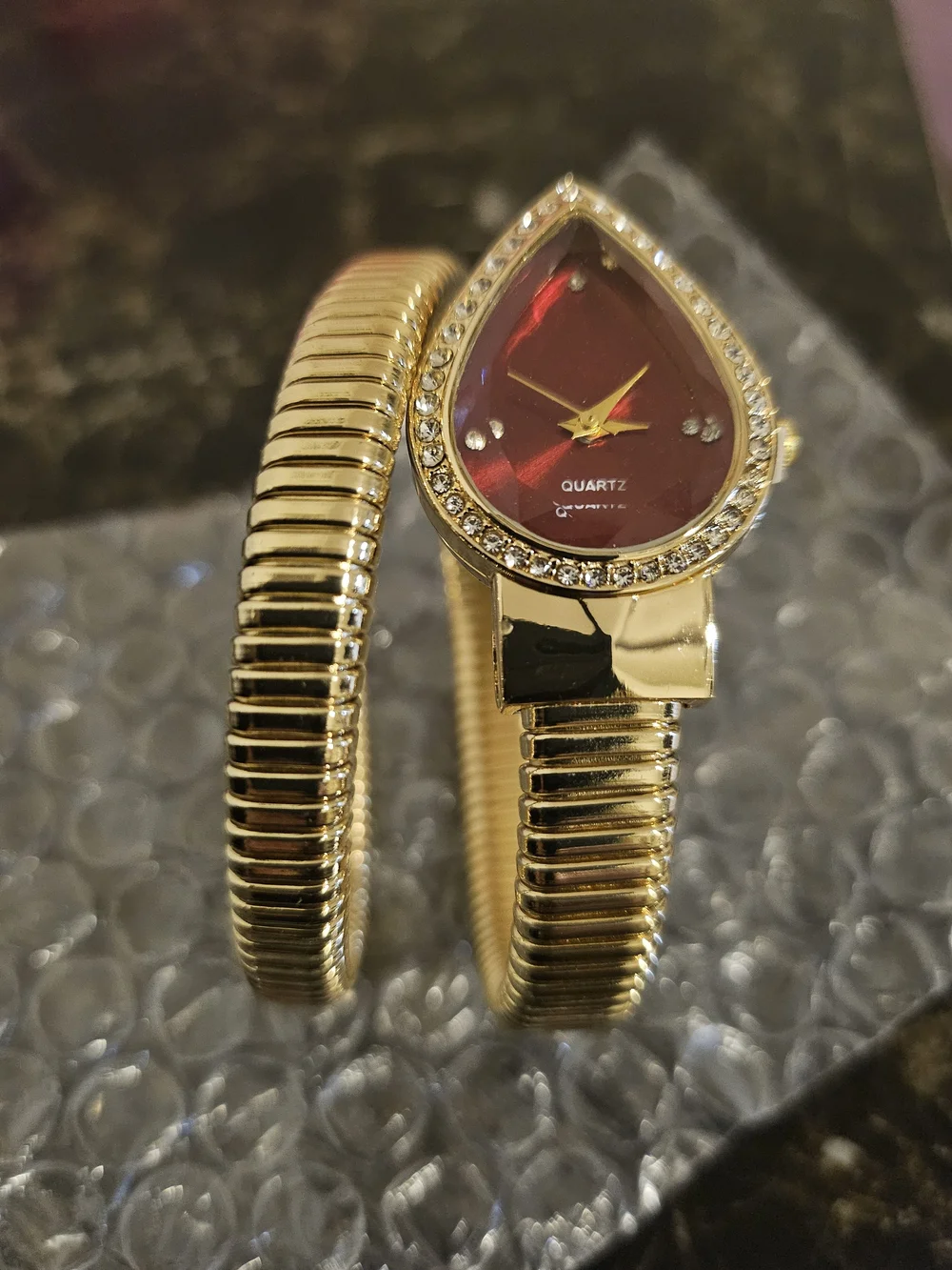& Other Stories Gold Coil Bangle Watch with Red Teardrop Dial